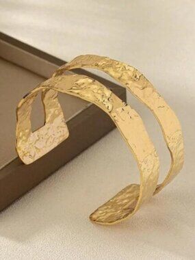Gold textured cuff bracelet bangle